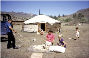 A Tuvan family with their yurt.